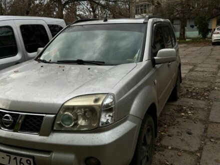 Серый Ниссан ИксТрейл, объемом двигателя 2.2 л и пробегом 308 тыс. км за 1500 $, фото 1 на Automoto.ua