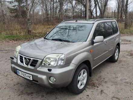 Серый Ниссан ИксТрейл, объемом двигателя 2 л и пробегом 200 тыс. км за 5900 $, фото 1 на Automoto.ua