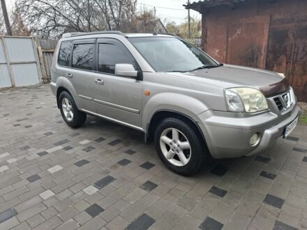 Серый Ниссан ИксТрейл, объемом двигателя 2.5 л и пробегом 286 тыс. км за 5800 $, фото 1 на Automoto.ua