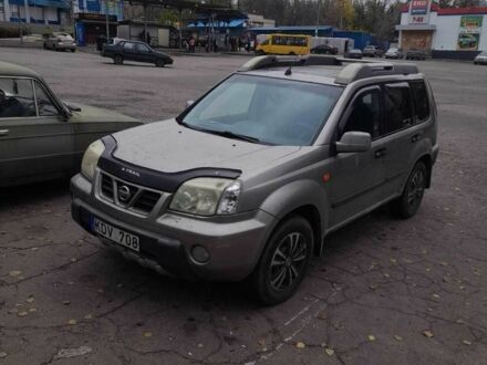 Серый Ниссан ИксТрейл, объемом двигателя 2.2 л и пробегом 450 тыс. км за 3099 $, фото 1 на Automoto.ua