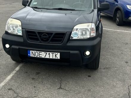 Серый Ниссан ИксТрейл, объемом двигателя 2 л и пробегом 420 тыс. км за 4000 $, фото 1 на Automoto.ua