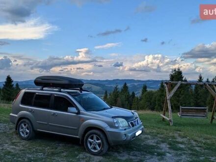 Серый Ниссан ИксТрейл, объемом двигателя 2.5 л и пробегом 193 тыс. км за 6500 $, фото 1 на Automoto.ua