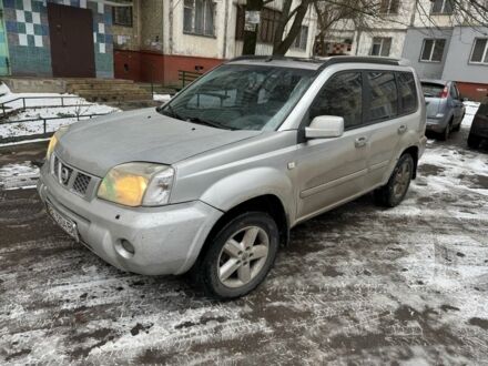 Сірий Ніссан ІксТрейл, об'ємом двигуна 2.5 л та пробігом 420 тис. км за 3990 $, фото 1 на Automoto.ua