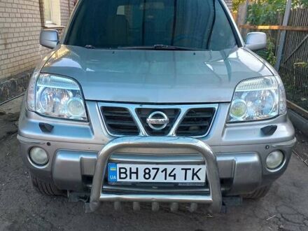 Сірий Ніссан ІксТрейл, об'ємом двигуна 2 л та пробігом 253 тис. км за 5500 $, фото 1 на Automoto.ua