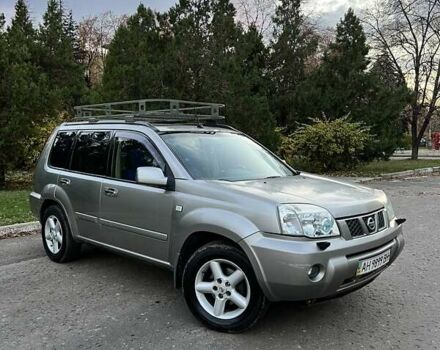 Серый Ниссан ИксТрейл, объемом двигателя 2 л и пробегом 312 тыс. км за 5300 $, фото 1 на Automoto.ua