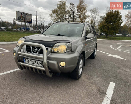 Серый Ниссан ИксТрейл, объемом двигателя 2 л и пробегом 336 тыс. км за 5750 $, фото 1 на Automoto.ua