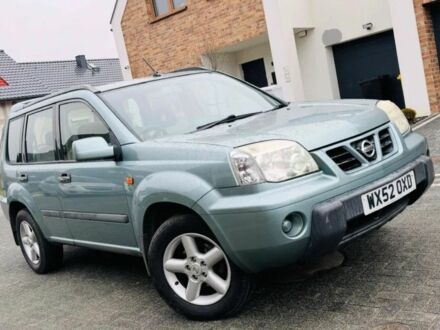 Серый Ниссан ИксТрейл, объемом двигателя 2 л и пробегом 160 тыс. км за 2600 $, фото 1 на Automoto.ua