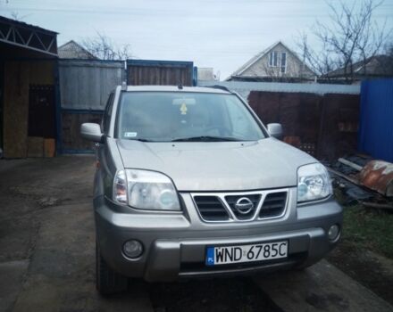 Серый Ниссан ИксТрейл, объемом двигателя 2 л и пробегом 242 тыс. км за 3300 $, фото 1 на Automoto.ua