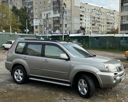 Серый Ниссан ИксТрейл, объемом двигателя 2 л и пробегом 305 тыс. км за 5100 $, фото 1 на Automoto.ua