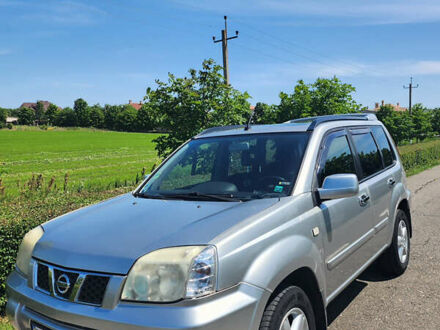 Серый Ниссан ИксТрейл, объемом двигателя 2.18 л и пробегом 297 тыс. км за 6000 $, фото 1 на Automoto.ua