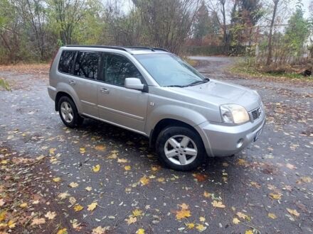 Серый Ниссан ИксТрейл, объемом двигателя 2 л и пробегом 450 тыс. км за 4042 $, фото 1 на Automoto.ua