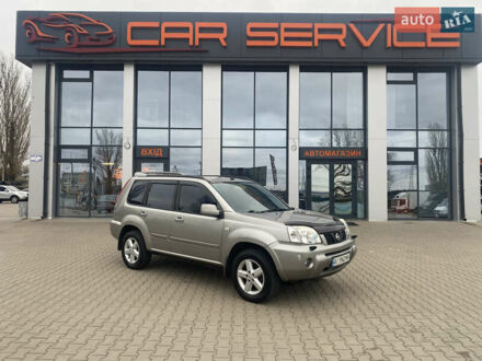 Серый Ниссан ИксТрейл, объемом двигателя 2 л и пробегом 246 тыс. км за 4499 $, фото 1 на Automoto.ua