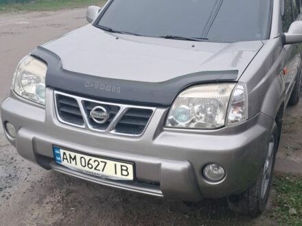 Серый Ниссан ИксТрейл, объемом двигателя 2 л и пробегом 290 тыс. км за 4950 $, фото 1 на Automoto.ua