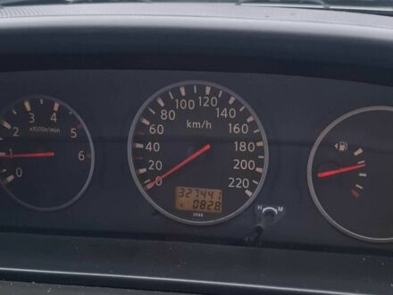 Серый Ниссан ИксТрейл, объемом двигателя 2.2 л и пробегом 327 тыс. км за 3077 $, фото 1 на Automoto.ua