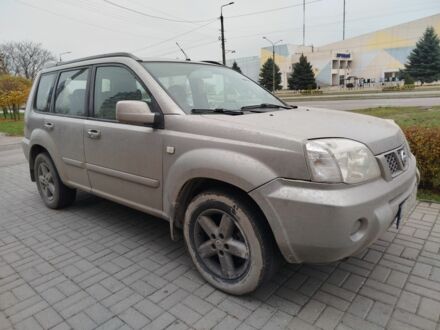 Серый Ниссан ИксТрейл, объемом двигателя 2.2 л и пробегом 193 тыс. км за 4000 $, фото 1 на Automoto.ua