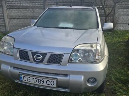 Серый Ниссан ИксТрейл, объемом двигателя 2.5 л и пробегом 240 тыс. км за 4750 $, фото 1 на Automoto.ua