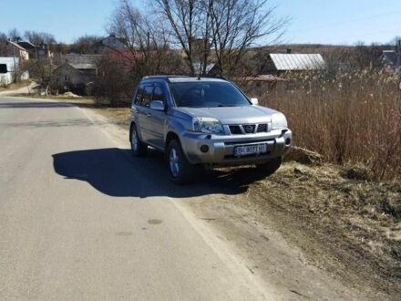 Сірий Ніссан ІксТрейл, об'ємом двигуна 2 л та пробігом 260 тис. км за 4999 $, фото 1 на Automoto.ua