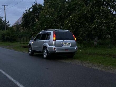 Сірий Ніссан ІксТрейл, об'ємом двигуна 2.49 л та пробігом 261 тис. км за 5700 $, фото 1 на Automoto.ua