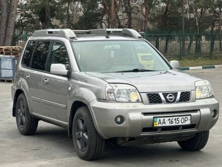 Сірий Ніссан ІксТрейл, об'ємом двигуна 2.5 л та пробігом 258 тис. км за 6500 $, фото 1 на Automoto.ua