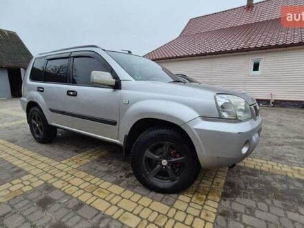 Серый Ниссан ИксТрейл, объемом двигателя 2.2 л и пробегом 490 тыс. км за 6000 $, фото 1 на Automoto.ua