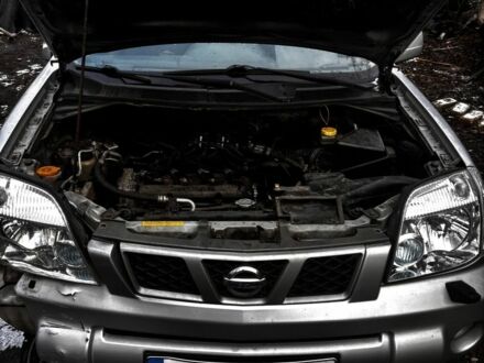 Сірий Ніссан ІксТрейл, об'ємом двигуна 2 л та пробігом 240 тис. км за 2500 $, фото 1 на Automoto.ua