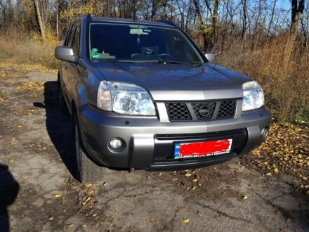 Серый Ниссан ИксТрейл, объемом двигателя 2.2 л и пробегом 286 тыс. км за 6000 $, фото 1 на Automoto.ua