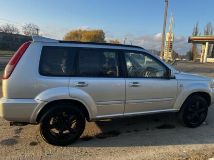 Серый Ниссан ИксТрейл, объемом двигателя 2.2 л и пробегом 304 тыс. км за 3569 $, фото 1 на Automoto.ua