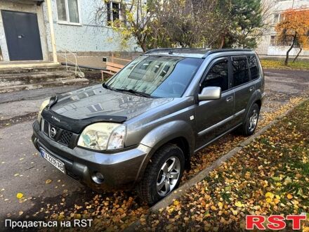 Серый Ниссан ИксТрейл, объемом двигателя 2.5 л и пробегом 333 тыс. км за 7100 $, фото 1 на Automoto.ua