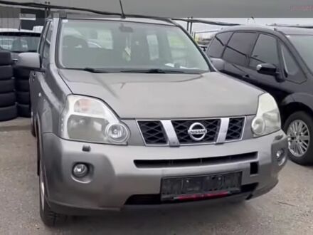 Серый Ниссан ИксТрейл, объемом двигателя 2 л и пробегом 320 тыс. км за 3495 $, фото 1 на Automoto.ua