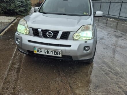 Серый Ниссан ИксТрейл, объемом двигателя 2 л и пробегом 251 тыс. км за 9300 $, фото 1 на Automoto.ua