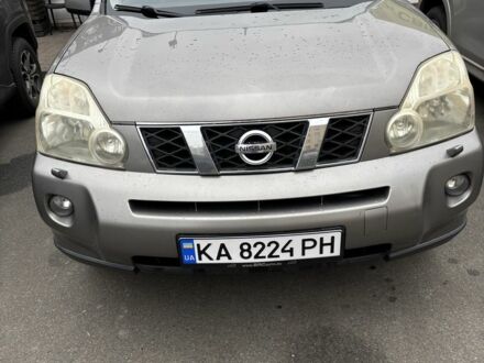Серый Ниссан ИксТрейл, объемом двигателя 2 л и пробегом 285 тыс. км за 8700 $, фото 1 на Automoto.ua