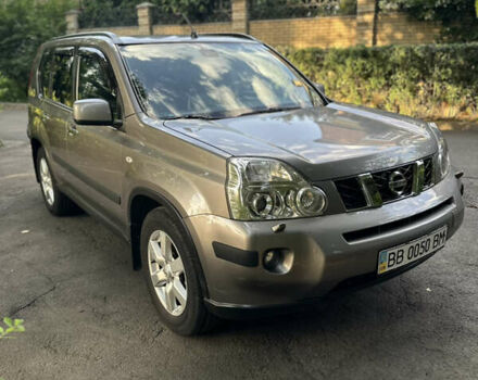 Сірий Ніссан ІксТрейл, об'ємом двигуна 2.5 л та пробігом 72 тис. км за 11000 $, фото 1 на Automoto.ua