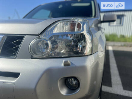 Серый Ниссан ИксТрейл, объемом двигателя 2 л и пробегом 222 тыс. км за 11499 $, фото 1 на Automoto.ua