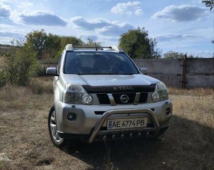 Сірий Ніссан ІксТрейл, об'ємом двигуна 2 л та пробігом 223 тис. км за 8900 $, фото 1 на Automoto.ua