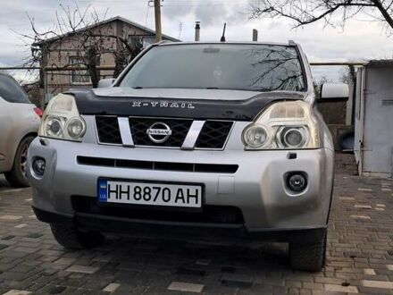 Серый Ниссан ИксТрейл, объемом двигателя 2 л и пробегом 233 тыс. км за 12222 $, фото 1 на Automoto.ua