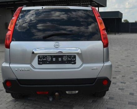 Серый Ниссан ИксТрейл, объемом двигателя 2 л и пробегом 317 тыс. км за 7000 $, фото 1 на Automoto.ua