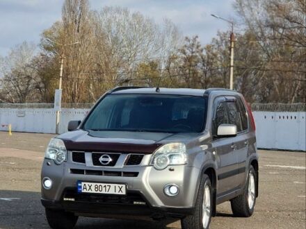 Серый Ниссан ИксТрейл, объемом двигателя 2.5 л и пробегом 236 тыс. км за 11000 $, фото 1 на Automoto.ua