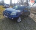 Синій Ніссан ІксТрейл, об'ємом двигуна 2 л та пробігом 240 тис. км за 5300 $, фото 1 на Automoto.ua