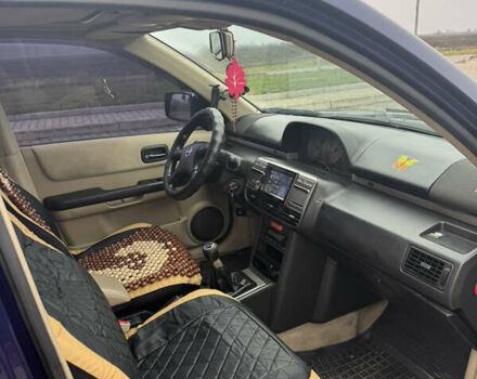 Синий Ниссан ИксТрейл, объемом двигателя 2 л и пробегом 222 тыс. км за 4700 $, фото 4 на Automoto.ua