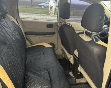 Синій Ніссан ІксТрейл, об'ємом двигуна 2 л та пробігом 222 тис. км за 4400 $, фото 4 на Automoto.ua