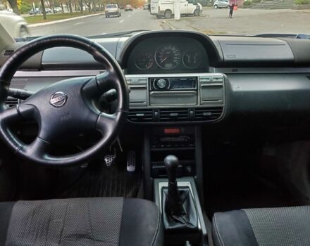 Синій Ніссан ІксТрейл, об'ємом двигуна 2 л та пробігом 300 тис. км за 4400 $, фото 4 на Automoto.ua