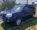 Синий Ниссан ИксТрейл, объемом двигателя 2 л и пробегом 246 тыс. км за 5400 $, фото 1 на Automoto.ua
