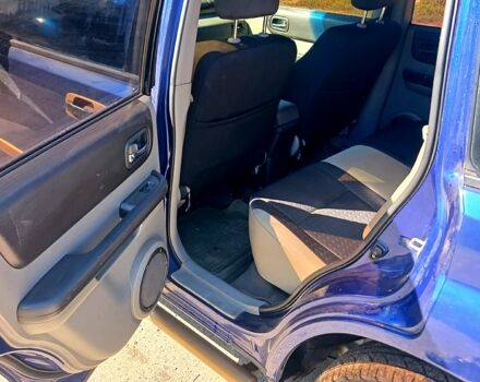 Синий Ниссан ИксТрейл, объемом двигателя 2 л и пробегом 250 тыс. км за 6000 $, фото 5 на Automoto.ua