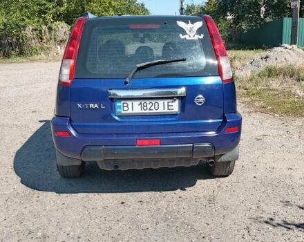 Синий Ниссан ИксТрейл, объемом двигателя 2 л и пробегом 388 тыс. км за 5000 $, фото 2 на Automoto.ua