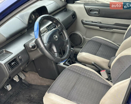 Синий Ниссан ИксТрейл, объемом двигателя 2 л и пробегом 247 тыс. км за 6200 $, фото 18 на Automoto.ua