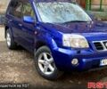 Синий Ниссан ИксТрейл, объемом двигателя 2 л и пробегом 245 тыс. км за 6200 $, фото 1 на Automoto.ua