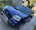 Синий Ниссан ИксТрейл, объемом двигателя 2 л и пробегом 350 тыс. км за 4500 $, фото 1 на Automoto.ua