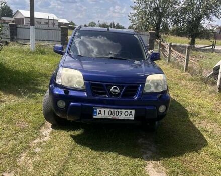 Синий Ниссан ИксТрейл, объемом двигателя 2 л и пробегом 246 тыс. км за 5400 $, фото 21 на Automoto.ua