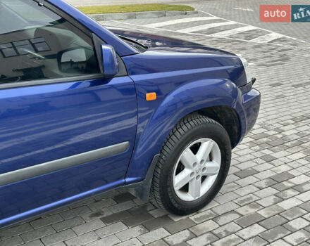 Синий Ниссан ИксТрейл, объемом двигателя 2 л и пробегом 247 тыс. км за 6200 $, фото 12 на Automoto.ua