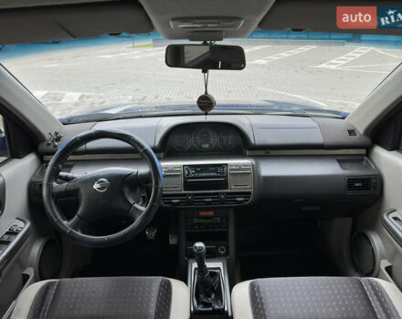 Синий Ниссан ИксТрейл, объемом двигателя 2 л и пробегом 247 тыс. км за 6200 $, фото 28 на Automoto.ua